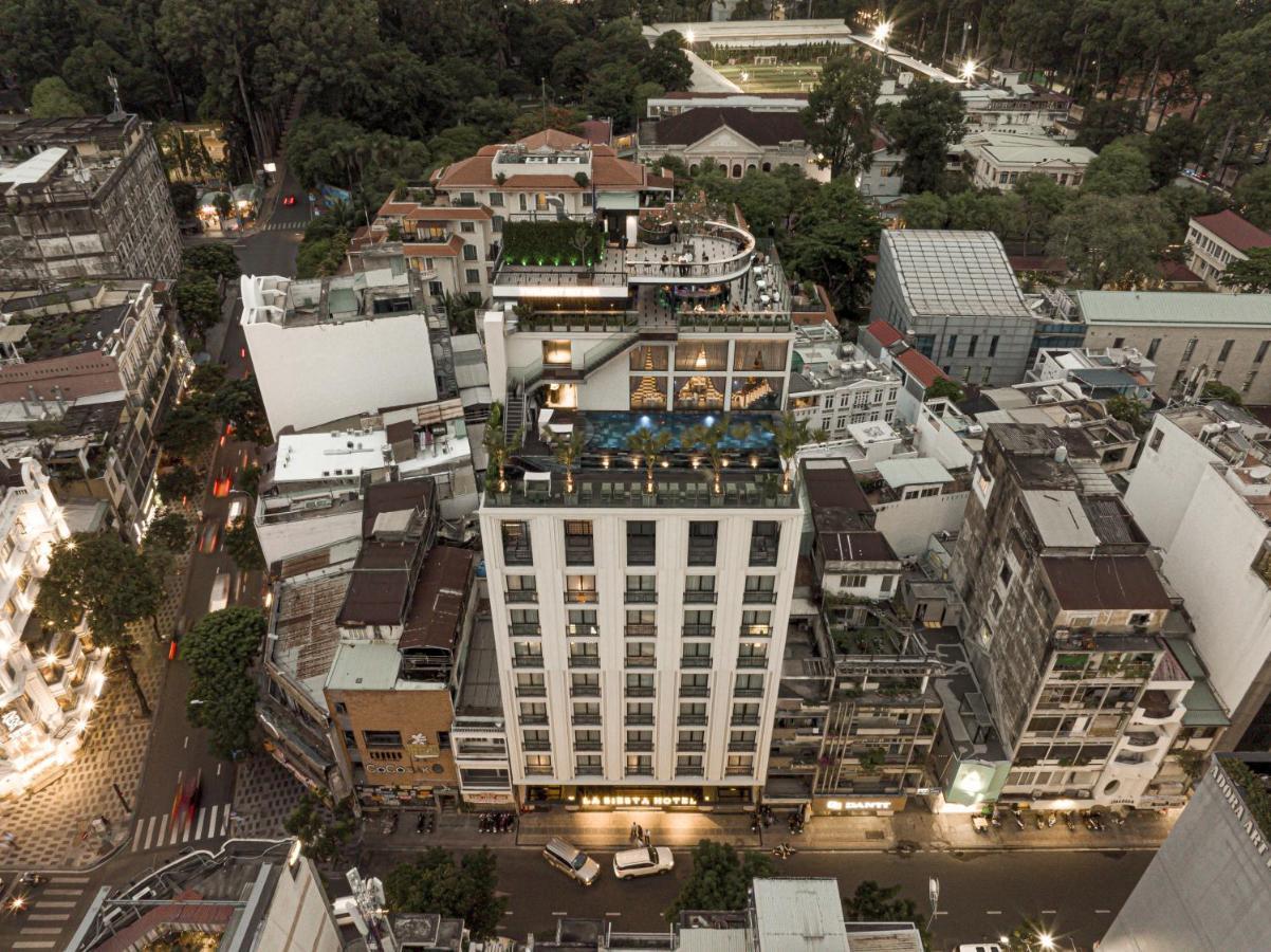 La Siesta Premium Saigon Hotel Ho Chi Minh City Exterior photo Aerial view of the hotel